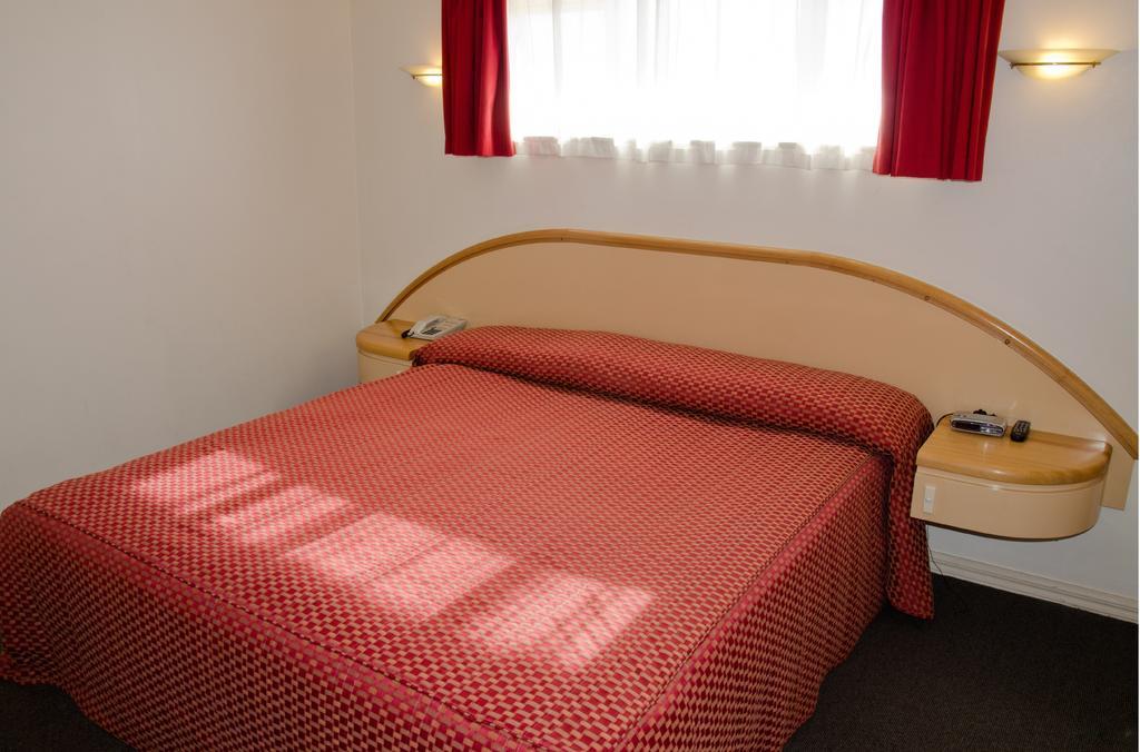 Beachfront Motel Napier Habitación foto